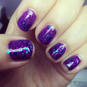 purple base with a glitter top coat