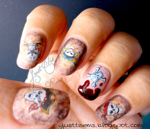 I did a saran wrap marble on the nails and a pirate skull water decal for more pics : http://justtisems.blogspot.com/2012/10/KKCenterHkPirateSkull.html