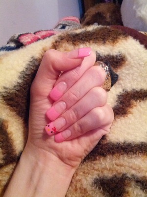 UV gel nails: pink French manicure with Hello Kitty design