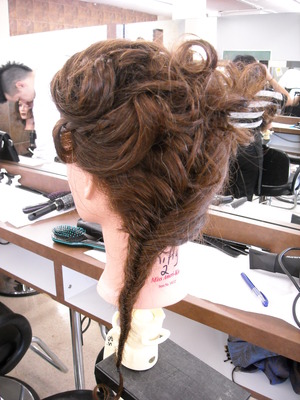 There are no products in this up-do it was supposed to be very natural, earthy, and fun, I only have a rubber band to hold the braid and some pins to hold the top in place.