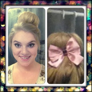 My second sock bun with a cute bow! I've tried the donuts they sell at h&m and I find that a sock works better with my layered hair! 
