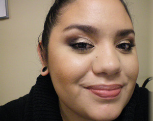 used mac eyeshadow in saddle and typographic and elf mineral eyeshadow in celebrity, eyeliner is elf gel liner. on my checks i have on mac minerslized blush in cheek and cheerful 
