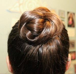 I wear this up-do to dance quite a bit. it looks so complicated, but it's not! That's why I love it! (: