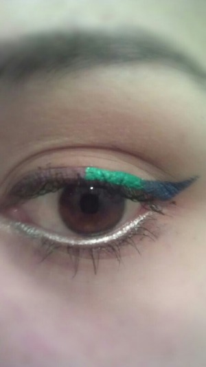 Create cat eyes with colored liquid eyeliners...