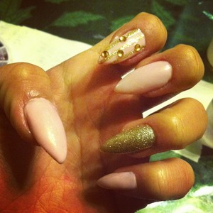 Pink and gold glitter stiletto nails