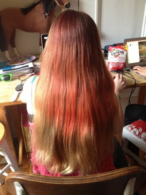 Beautiful right? 
Original color: Dirty blonde
Died it: red, with a little of light blue