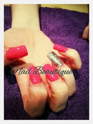 acrylics with pink opi polish and silver glitter. 