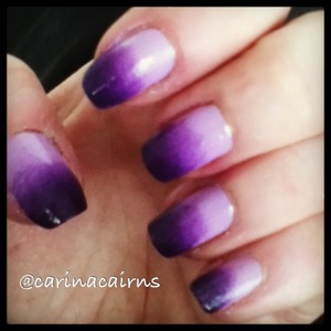 Purple to lilac gradient nails. Lilac base built up to dark purple. Hand done using a latex sponge in layers. 