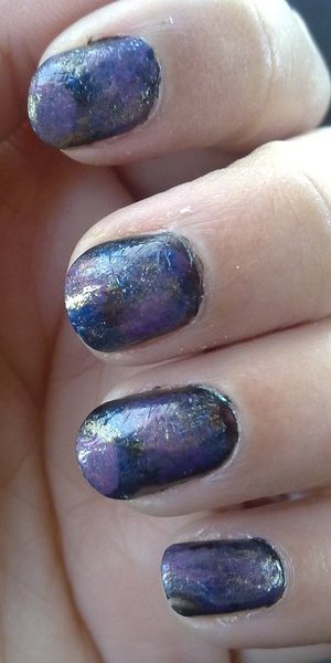Space inspired nail art