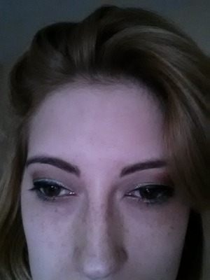 just a simple cat eye with a mauvey bronze and green shadow. let me know what cha and think