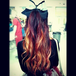 Half up wavy hairstyle with a cheer bow! 