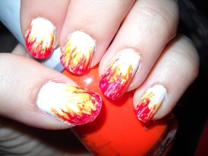 Hunger Games inspired flame nails.
