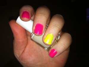 bright pink nails with a neon yellow accent nail. I used An essie nailpoilish under the white to make it a bit more opaque.

Pink: Esse Polish in Lights
Yellow: China Glaze polish in Yellow Polka Dot Bikini
