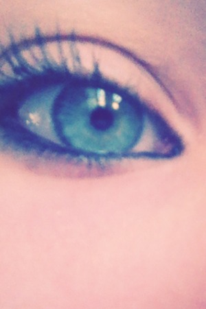 Put eyeliner in the waterline. Put one coat of thick mascara on.