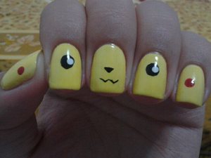 This nail design have been everywhere on the internet so I tried it out since it is soooo adorable! <3 I walked around my house and school showing everyone and going pika at them. Quite a fun nail design to rock!