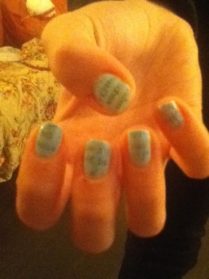 My friends Newspaprer Nails. She painted them herself. 