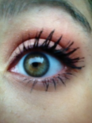 Grey eye liner, peach colored eye shadow 