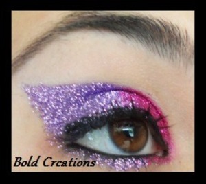 A purple and pink cat eye look I created using glitter from the Red Carpet Manicure set