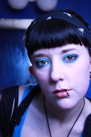 bettie bangs with blue/black eyeshadow http://www.youtube.com/user/WorkingClassBeauty#p/u/22/EJp4rkw_Spk