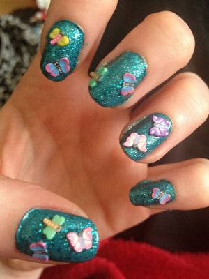 I used barry m green glitter polish & the wee butterflies i got from the pound shop. 