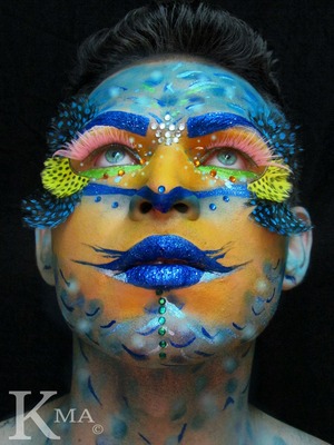 Diving deep into the sea this fresh look portraits the beauty of the ocean through the art of make up. 