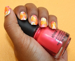 Try the new nail trend of splatter nails but incorporate summer neon colours from China Glaze.
http://chinadolltt.blogspot.com/2012/06/splatter-summer-neon-nails-with.html