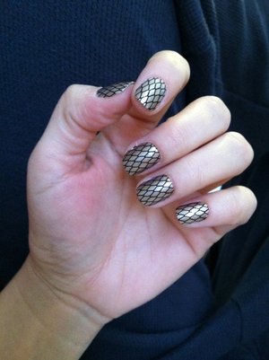 Sally Hansen salon effects :) so easy...my favorite pattern from the collection so far.
