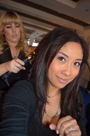 Getting my hair curled at the StyleHaul event in Beverly Hills Dec 2011