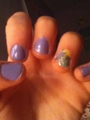 Saw the look in Us magazine and tried it out...the accent nail turned out messy but i like the look overall