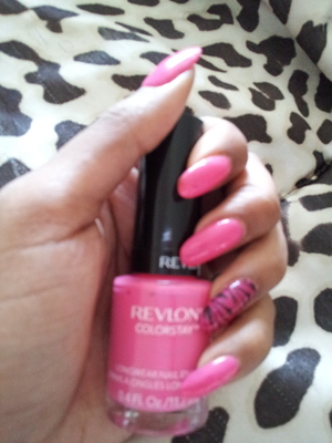 I used Revlon Colorstay in Passionate Pink and a cute hot pink and zebra Sally Hansen Salon Effects design.