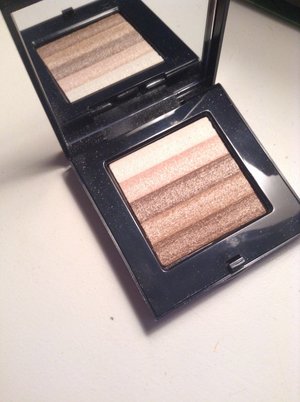 I love this because it gives a warm glow  and shimmer to my skin without  overpowering the rest of my makeup! 