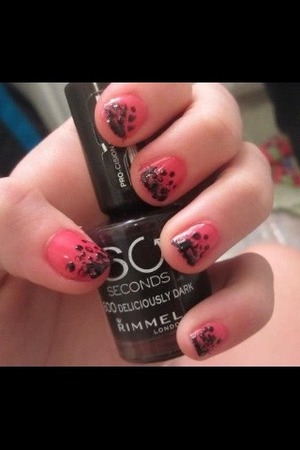 Fading black into pink nails.