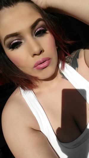 Pink brown cut crease with a pink lip.