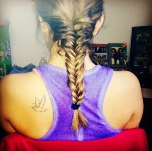 My Roomate loves the fish tail braids that I do for a simple and easy hairstyle day :) great for second day hair! 