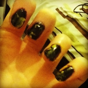 My first attempt on batman nails sorry for the crappy quality and the bad batman logo haha :) 