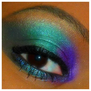 This was inspired by a Roberto Cavalli runway look

SACHA Cosmetics eyeshadows was used, aswell as avon for products for an eyeshadow base.