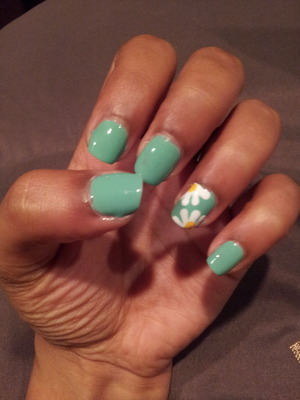 mint blue base and daisy flowers.
