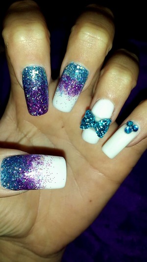 Purple & blue glitter on wintery white acrylic, blue sparkle bows and diamant?'s 