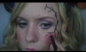 Creepy Broken Porcelain Doll Halloween Makeup Look.