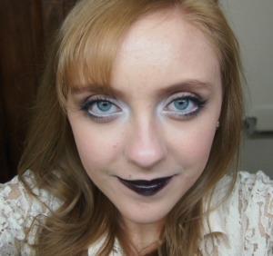 I was working this bright eye makeup and black lips today! 