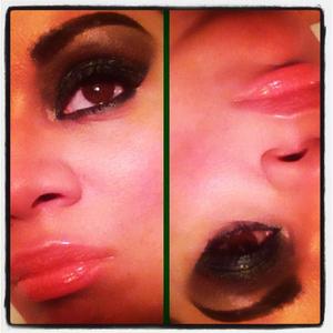 I have a dark green palllette with black eyeshadow on the crease and nude lipgloss on..