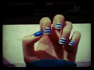 I used: KIKO COSMETIC's nail-polish
#200 (transparent)
#336 (electric blue)

and adhesive tape with white nail-polish, cut into strips