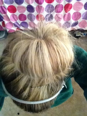 I doubled up the socks so I would have a bigger bun. I have layered hair so it's hard to do the rolling way.