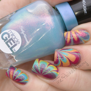http://www.thepolishedmommy.com/2016/03/sally-hansen-the-digital-overload-collection.html