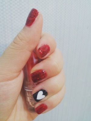 actually, I didn't do this for V-day. but i think it will be a good choice for VALENTINE DATE!

I used:
-base coat and top coat
-red(base color for glitters), black, white polish
-red glitter polish
-scotch tape(to make heart shpe)