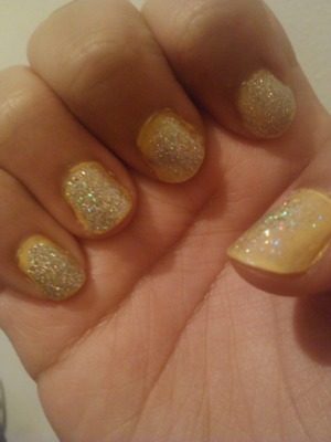 yellow nail Polish with a glittery top