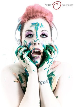 covered in paint, dripping from her headphones i love this look!