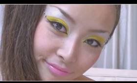 Makeup yellow eye-shadow with clear crystal