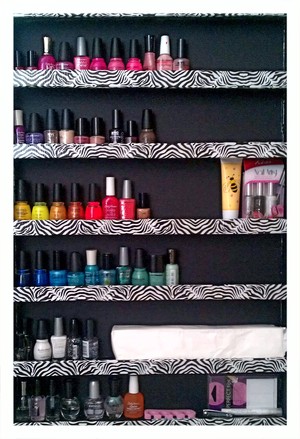Nail Storage

My friend made this cute nail polish stand from poster board and fashion duck tape! It's an easy way to store and organize all your nail polishes.