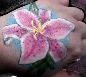 Stargazer Lily done on my hand in all eye shadow and liquid medium